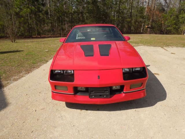 1987 red Chevrolet Camaro Coupe