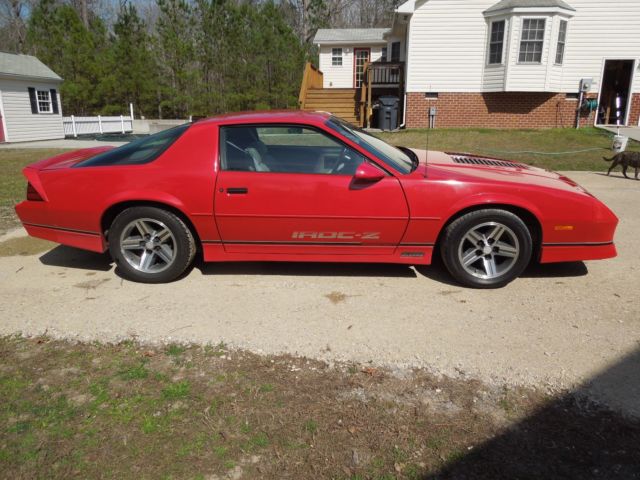 1987 red Chevrolet Camaro Coupe