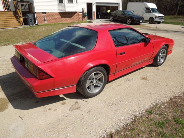 1987 red Chevrolet Camaro Coupe