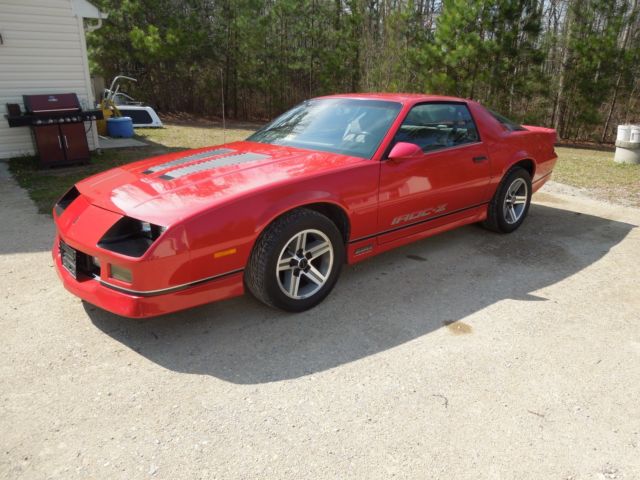 1987 red Chevrolet Camaro Coupe