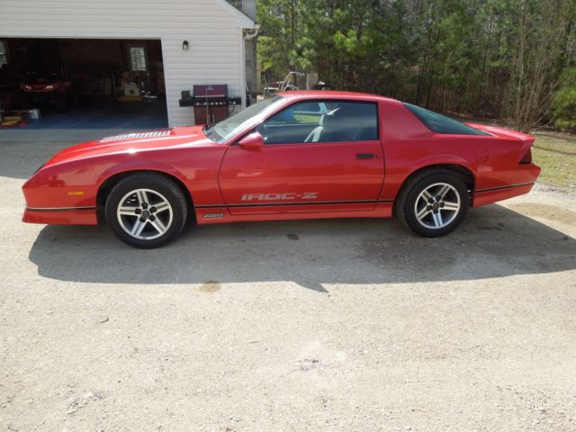 1987 red Chevrolet Camaro Coupe