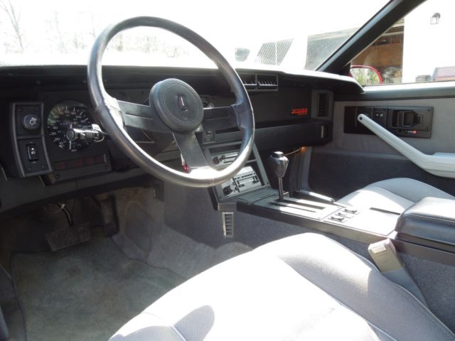 1987 red Chevrolet Camaro Coupe