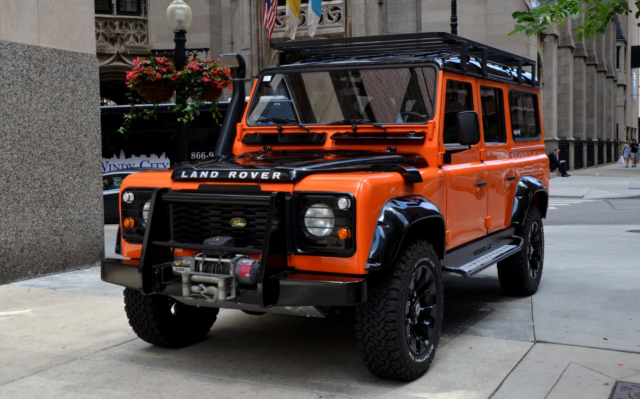 1987 Orange Land Rover Defender SUV