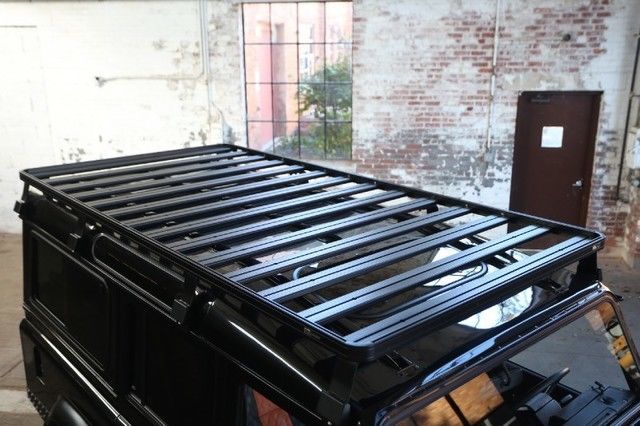 1987 Orange Land Rover Defender SUV