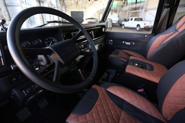 1987 Orange Land Rover Defender SUV