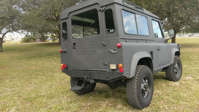 1900 Black Land Rover Defender SUV