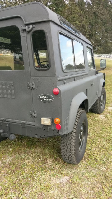 1900 Black Land Rover Defender SUV