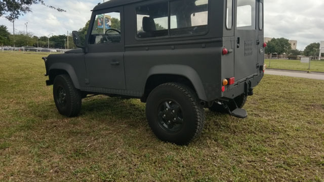 1900 Black Land Rover Defender SUV
