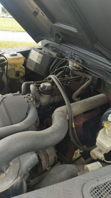 1900 Black Land Rover Defender SUV