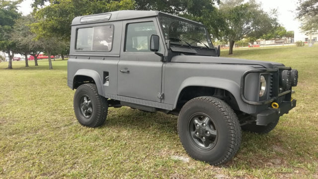 1900 Black Land Rover Defender SUV
