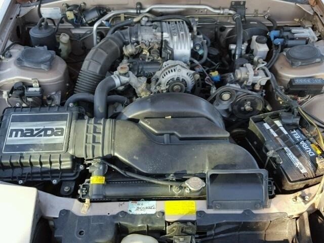 1987 Gold Mazda RX-7 Coupe