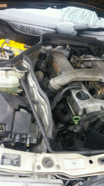 1987 Gold Mercedes-Benz 190-Series Sedan