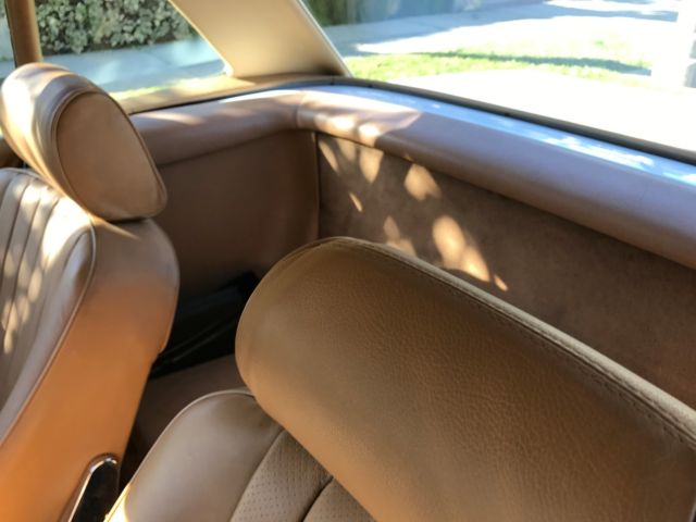 1987 white Mercedes-Benz SL-Class Convertible