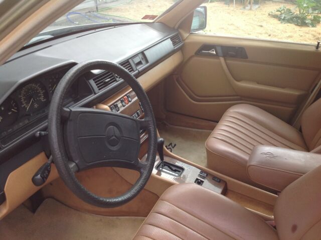 1987 Gold Mercedes-Benz 300-Series 4Door Sedan