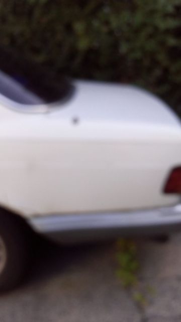 1987 White Mercedes-Benz 400-Series Sedan