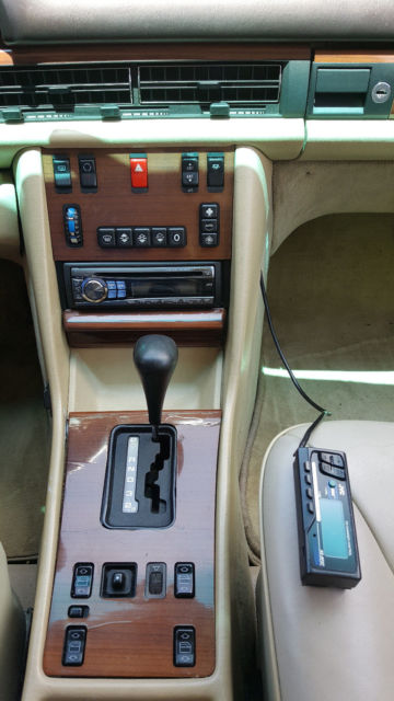 1987 Burgundy Mercedes-Benz 400-Series Sedan