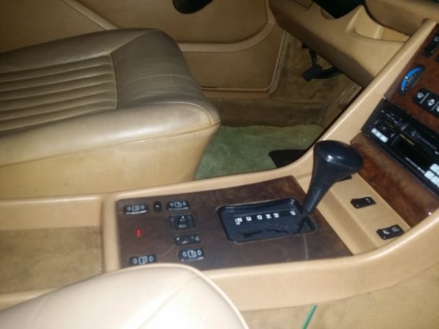 1987 gunstock grey/gold trim Mercedes-Benz 500-Series Sedan