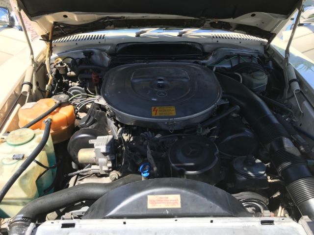 1987 Cream Mercedes-Benz SL-Class Convertible