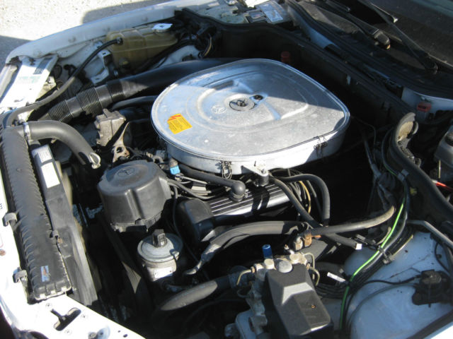 1987 White Mercedes-Benz 400-Series Sedan