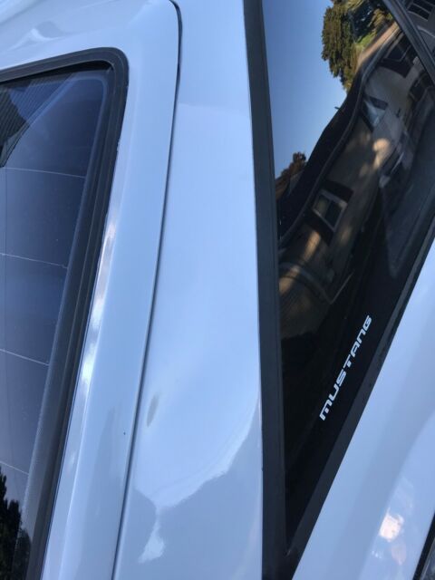 1987 Gray/white Ford Mustang Hatchback