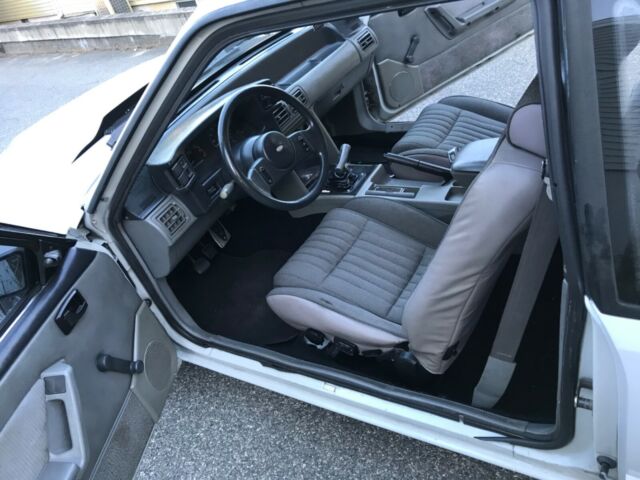 1987 Gray/white Ford Mustang Hatchback
