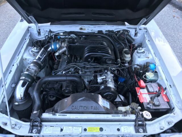 1987 Gray/white Ford Mustang Hatchback