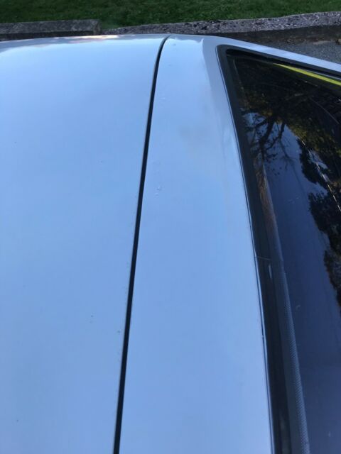 1987 Gray/white Ford Mustang Hatchback