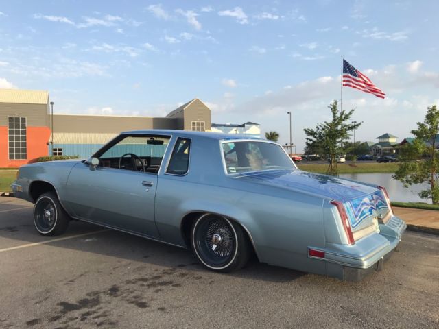 1987 Custom Blue Oldsmobile Cutlass Sedan