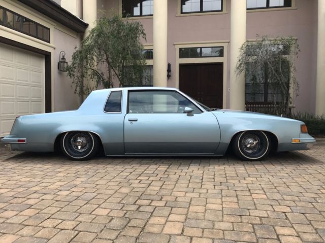 1987 Custom Blue Oldsmobile Cutlass Sedan