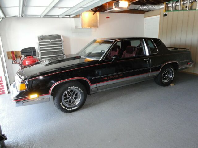 1987 Black Oldsmobile Cutlass Coupe