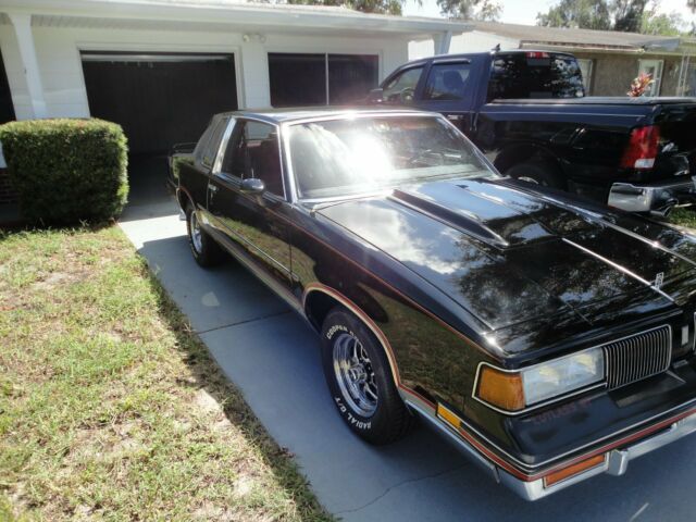 1987 Black Oldsmobile Cutlass Coupe