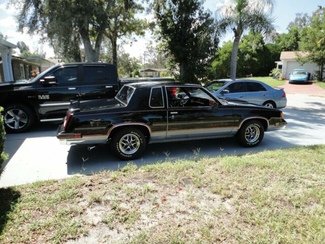 1987 Black Oldsmobile Cutlass Coupe