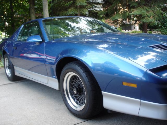 1987 Bright Blue Metallic-Silver lower trim Pontiac Trans Am Coupe