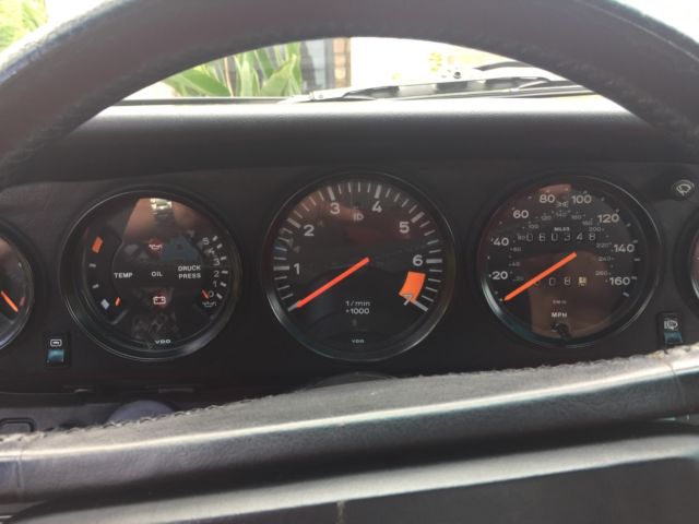 1987 silver metallic Porsche 930 Coupe