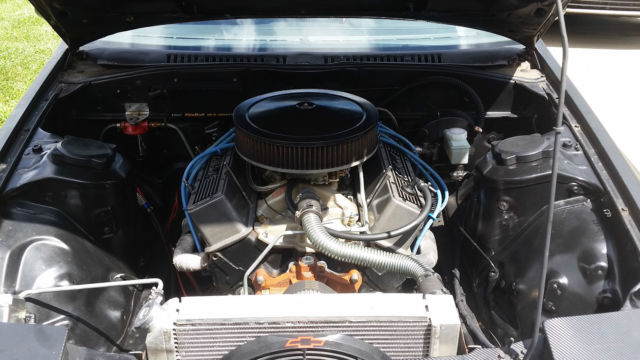 1987 black Mazda RX-7 2 door coupe