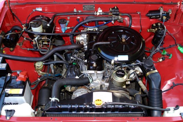 1987 Red Toyota Hilux Crew Cab Pickup