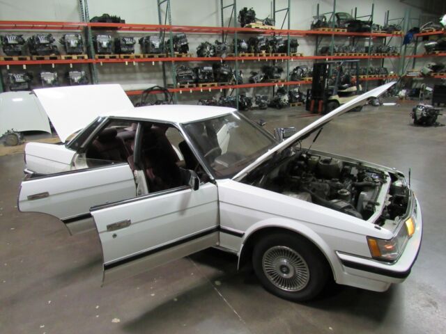 1987 White Nissan Mark 2 grande Sedan