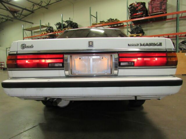 1987 White Nissan Mark 2 grande Sedan