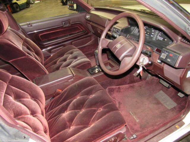 1987 White Nissan Mark 2 grande Sedan