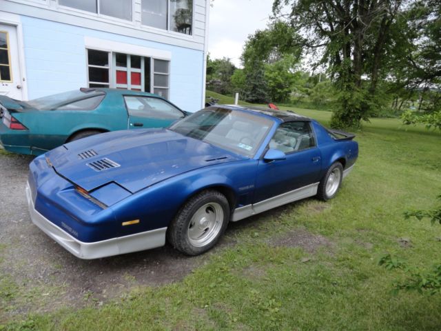 1987 blue Pontiac Trans Am Hatchback