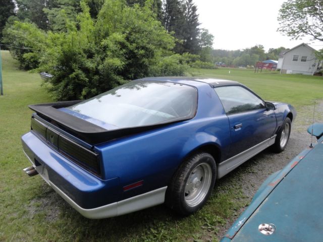 1987 blue Pontiac Trans Am Hatchback