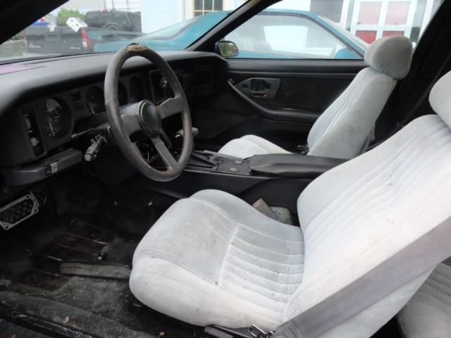 1987 blue Pontiac Trans Am Hatchback