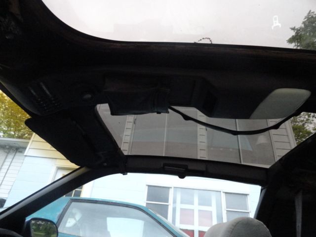 1987 blue Pontiac Trans Am Hatchback