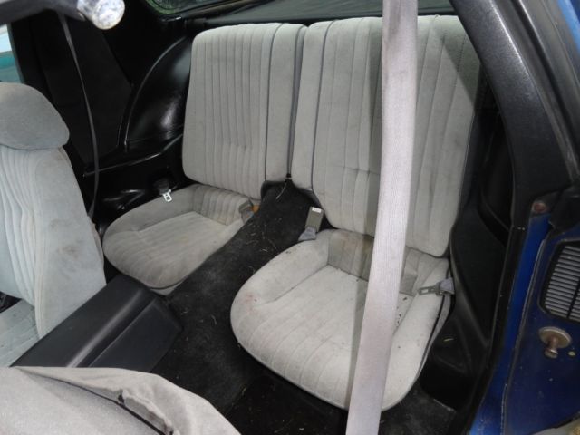 1987 blue Pontiac Trans Am Hatchback