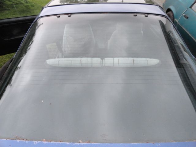 1987 blue Pontiac Trans Am Hatchback