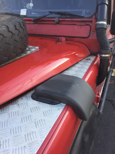 1987 Red Land Rover Defender SUV