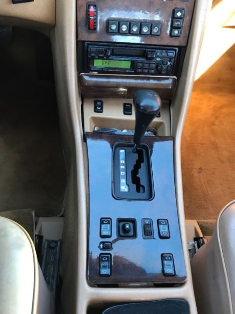 1987 Gold Mercedes-Benz 500-Series Coupe