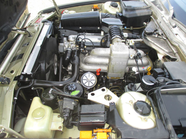 1988 Gold BMW 7-Series Sedan