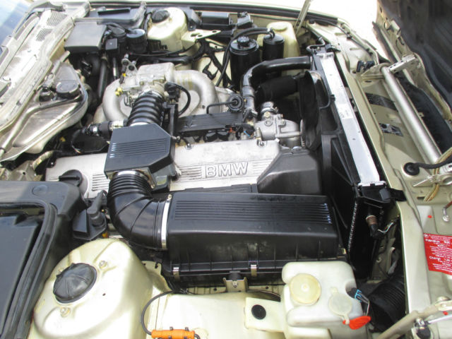 1988 Gold BMW 7-Series Sedan