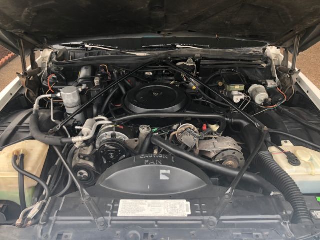 1988 White Cadillac Brougham Sedan